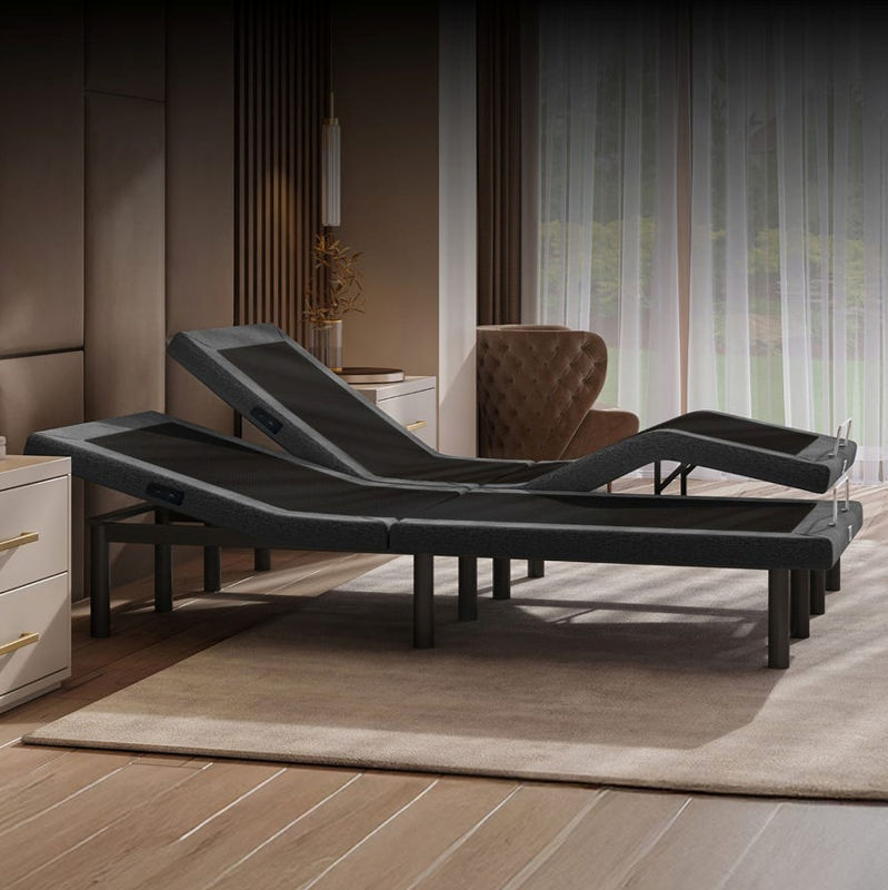 Puffy Serenity adjustable base electric reclining daybeds with black frames are arranged on a beige rug in a modern, warm-toned bedroom setting.