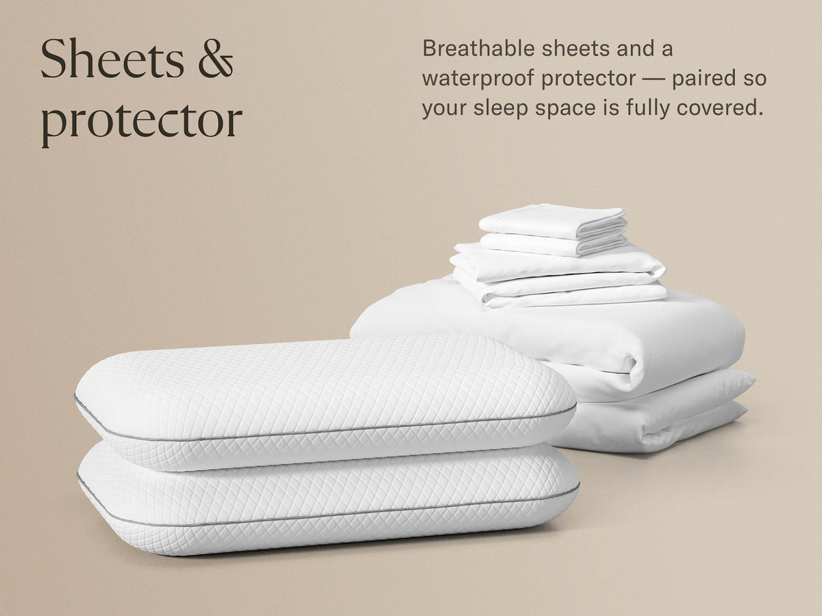 White quilted pillowcases stacked in front of folded white sheets and a white waterproof protector on a warm beige background, with the text 'Sheets & protector' and a descriptive copy at the top right.