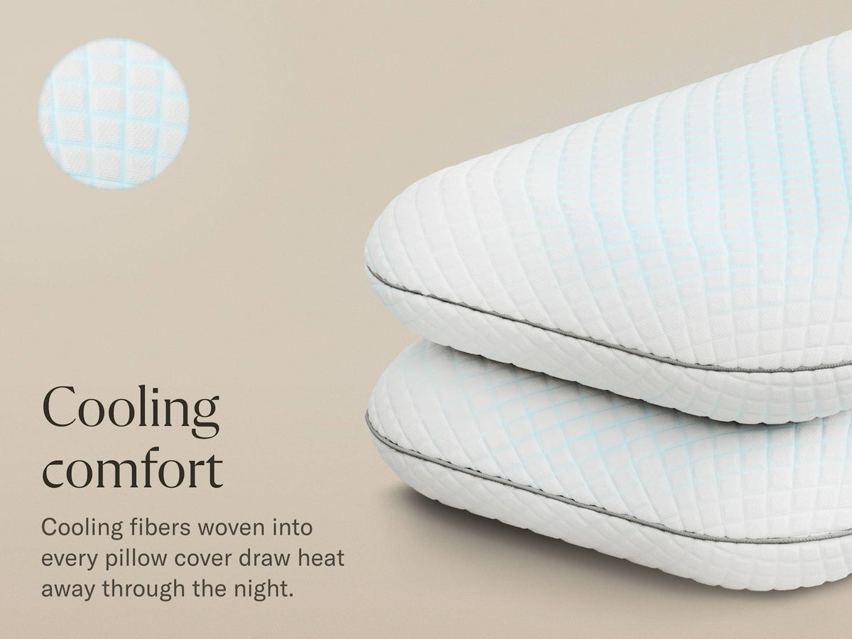 Two white quilted pillows stacked on a beige background with text reading 'Cooling comfort' and a circular inset showing a light blue cooling grid pattern.