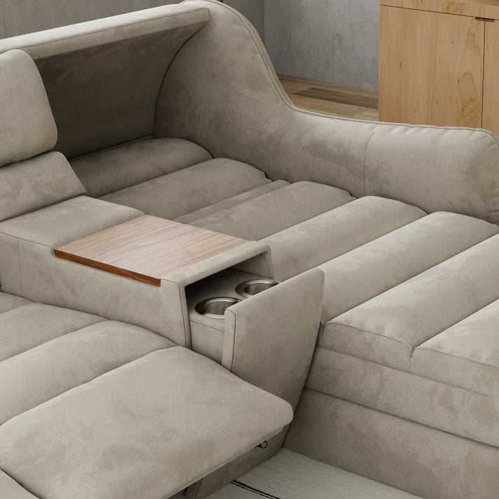 Beige sectional sofa with a built-in side table and cup holders.