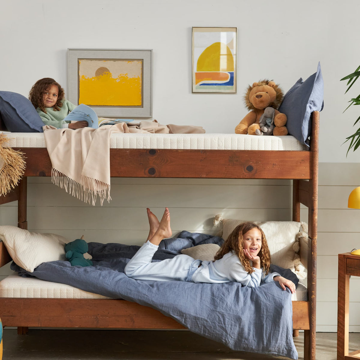 Avocado Eco Organic Kids Mattresses in a bunk-bed setting; frame and bedding sold separately