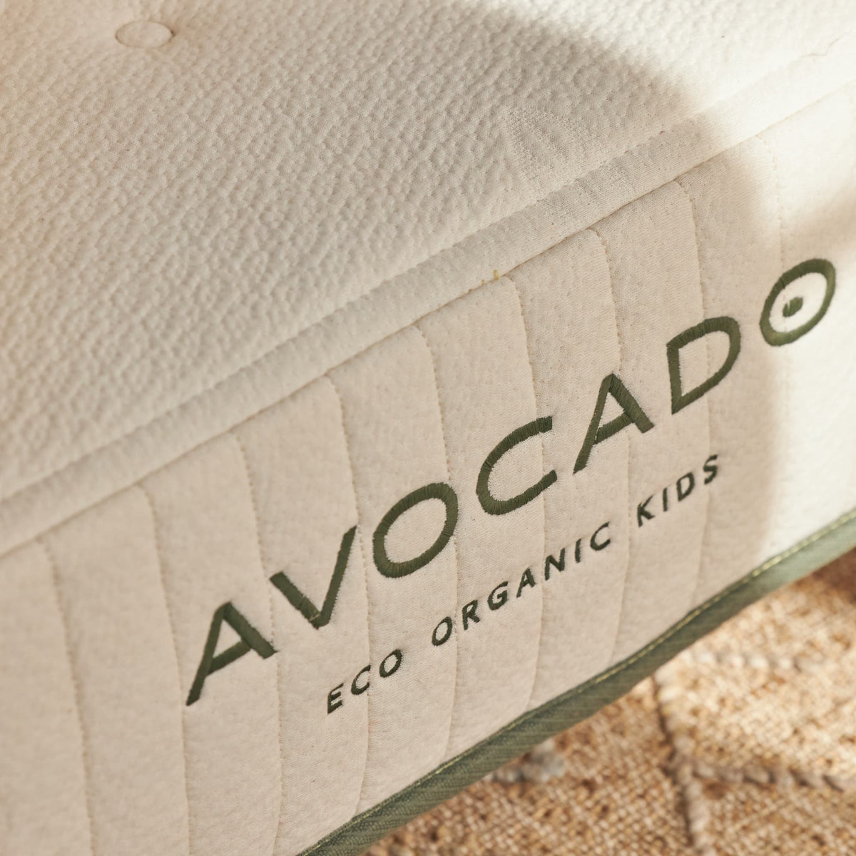 Avocado Eco Organic Kids Mattress side panel and stitched product label