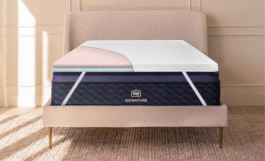 Microcoil Mattress Topper by Brooklyn Bedding on a bed