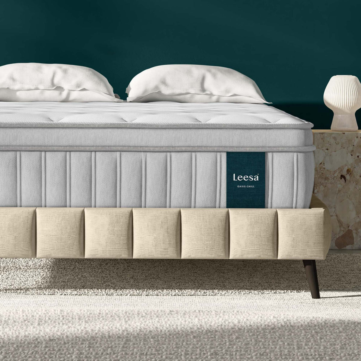 Leesa Oasis Chill Hybrid Mattress on an upholstered bed